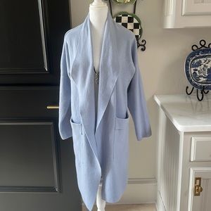 Long sweater cardigan with pockets. Brand new. Never worn. Size XL.